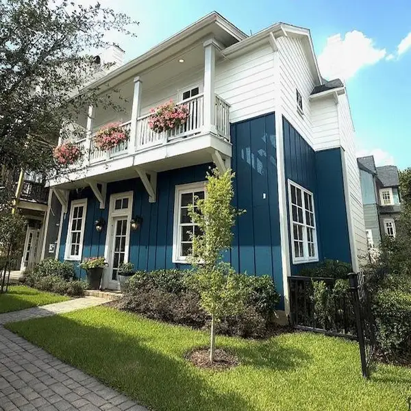 Front exterior of a new home in Eastwood Green, Houston, TX, highlighting curb appeal (Image 13).