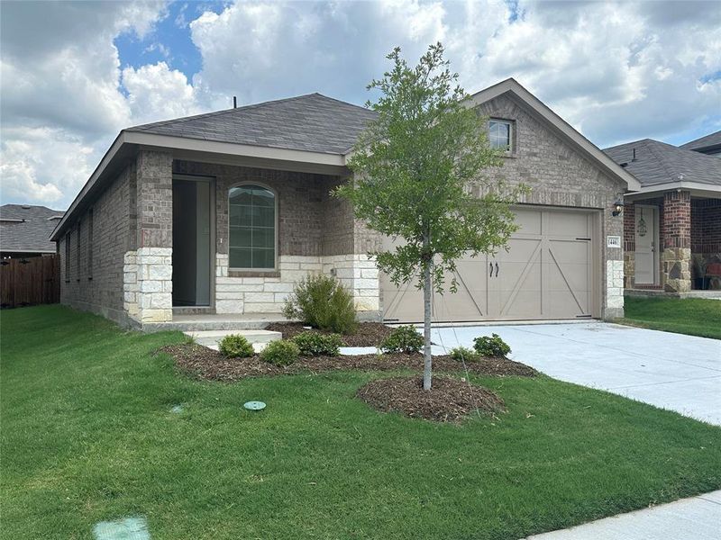 Front exterior of a new home in Cartwright Ranch, Crandall, TX, highlighting curb appeal (Image 15). Front exterior of a new home in Cartwright Ranch, Crandall, TX, highlighting curb appeal (Image 15).