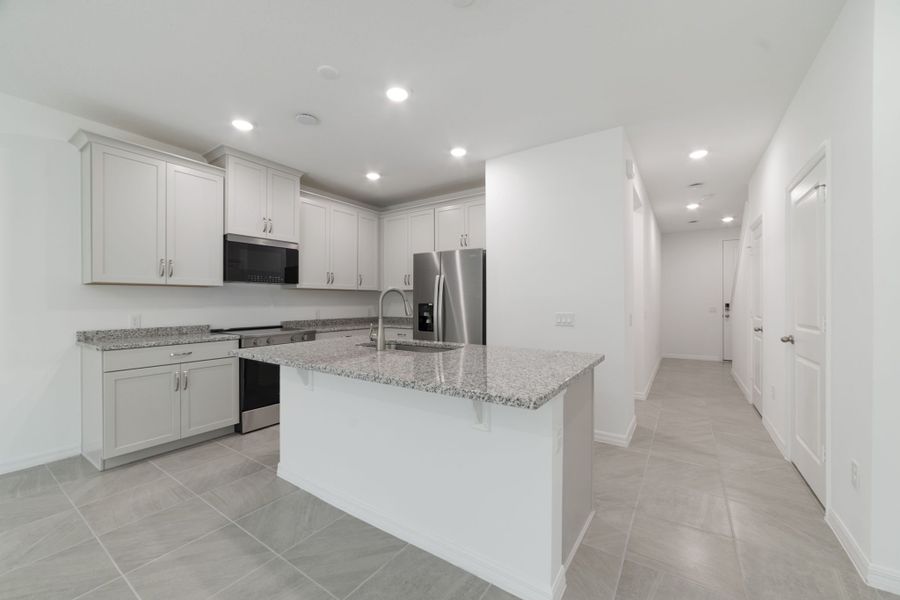 Furnished interior view inside a new home in Towns at Greenleaf, Oviedo (Image 18).