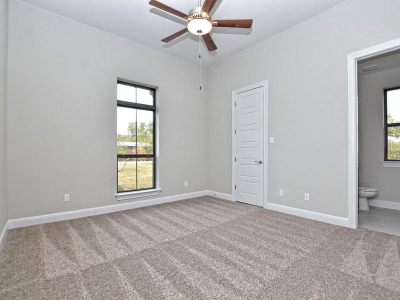 Representative unfurnished interior of a home built from the Madera II by Giddens Homes in Scofield Farms Estates, Georgetown (Image 312).