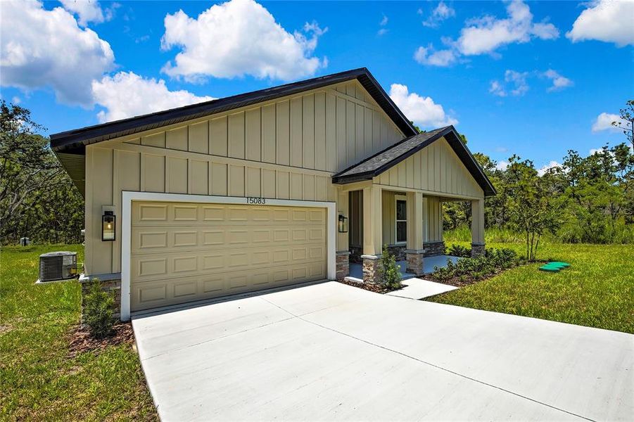 Front exterior of a new home in , Brooksville, FL, highlighting curb appeal (Image 28).