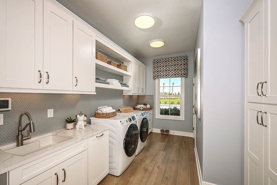 Representative furnished interior of a home built from the Key West II by Homes by WestBay in Crosswind Ranch, Parrish (Image 21).