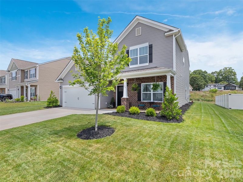 Front exterior of a new home in , Fletcher, NC, highlighting curb appeal (Image 2). Front exterior of a new home in , Fletcher, NC, highlighting curb appeal (Image 2).