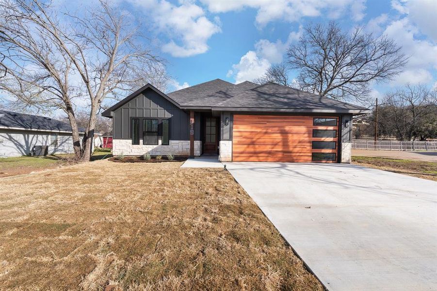 Front exterior of a new home in , Hillsboro, TX, highlighting curb appeal (Image 2). Front exterior of a new home in , Hillsboro, TX, highlighting curb appeal (Image 2).