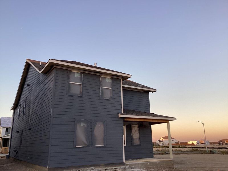 Exterior details and patio area of a home in The Homestead at Lariat, Liberty Hill (Image 3).
