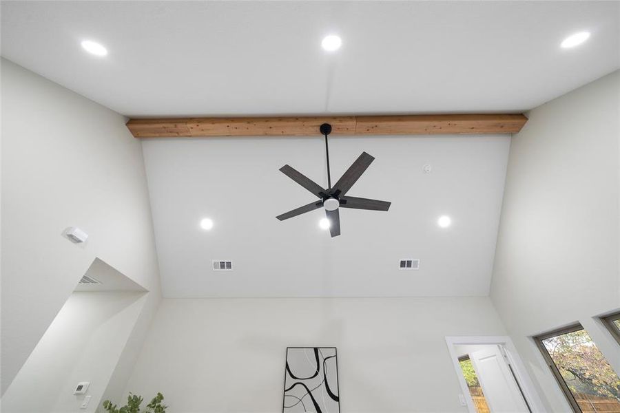 Details featuring beamed ceiling and ceiling fan