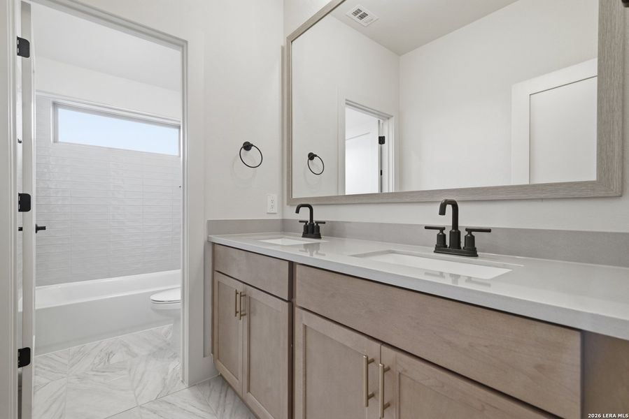 Furnished interior view inside a new home in Haby Hill 50s, San Antonio (Image 12).