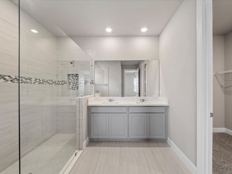 Primary Bathroom in the Coral floorplan at 6326 NW Sweetwood Drive in Brystol at Wylder