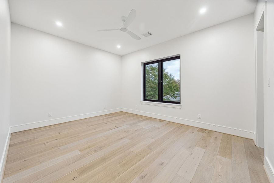 Bedroom #4 - offers walk-in closet with custom built-ins and an en-suite bath.