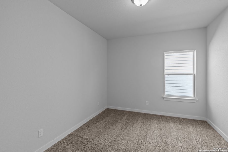 Spacious, unfurnished interior of a new home in The Meadows at Hunters Ranch, San Antonio (Image 21).