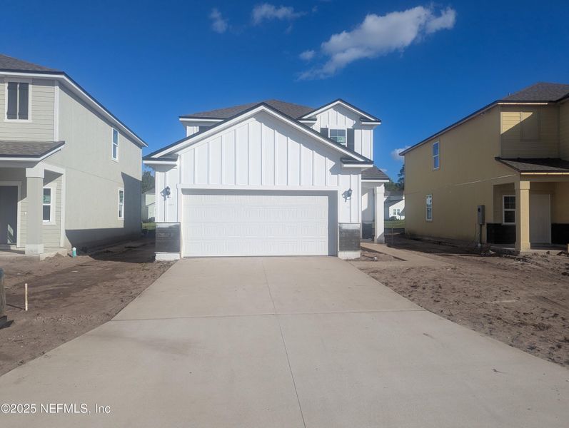 Exterior details and patio area of a home in Palm Series at The Landings at Pecan Park, Jacksonville (Image 1). Exterior details and patio area of a home in Palm Series at The Landings at Pecan Park, Jacksonville (Image 1).