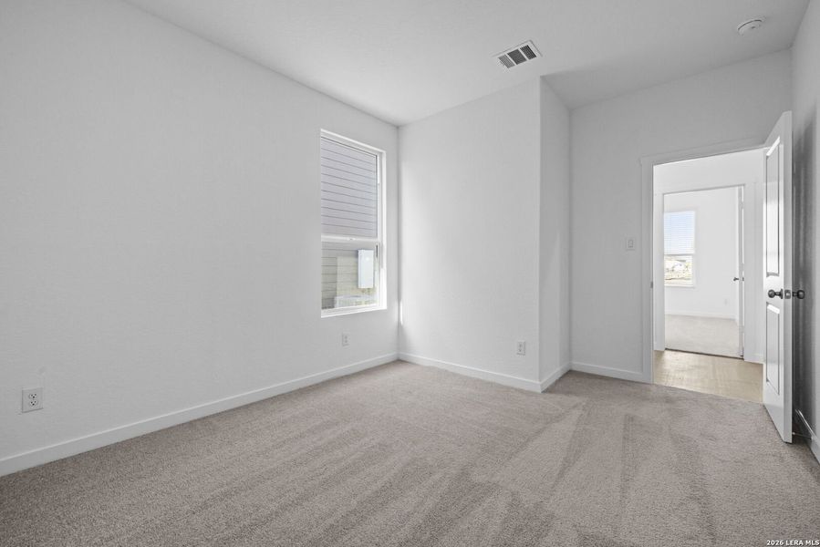 Spacious, unfurnished interior of a new home in Voss Farms, New Braunfels (Image 11).