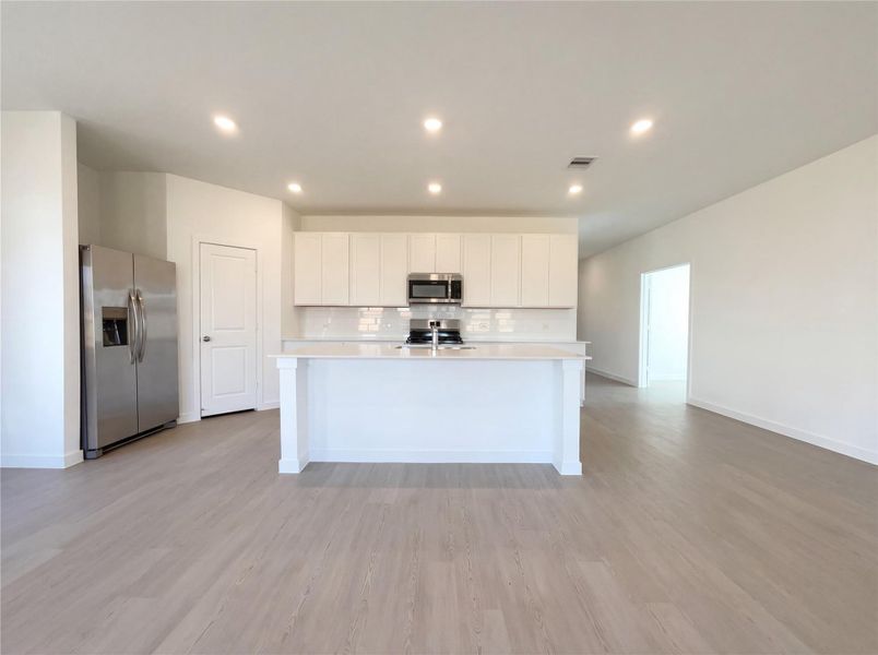 Furnished interior view inside a new home in Sunterra, Katy (Image 5). Furnished interior view inside a new home in Sunterra, Katy (Image 5).