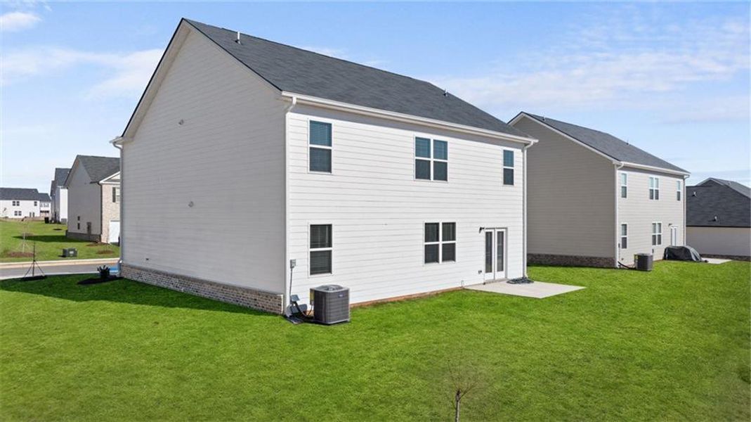 Exterior details and patio area of a home in Poplar Preserve, Newnan (Image 2).