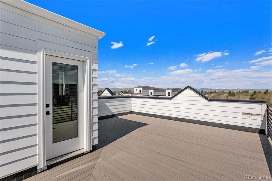 Exterior details and patio area of a home in Prelude at TAVA Waters, Denver (Image 25).
