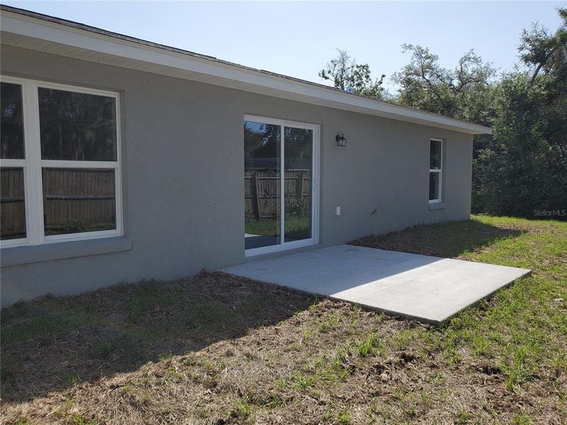 Front exterior of a new home in , Ocklawaha, FL, highlighting curb appeal (Image 21).