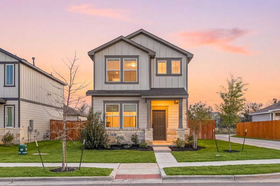 Front exterior of a new home in , Round Rock, TX, highlighting curb appeal (Image 23).
