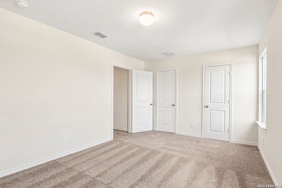 Spacious, unfurnished interior of a new home in Woodside Farms, Seguin (Image 34).