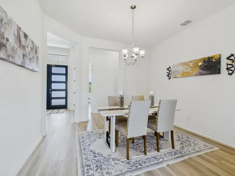 Furnished interior view inside a new home in Potranco Oaks, Castroville (Image 8).