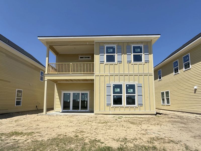 Exterior details and patio area of a home in Blue Heron Retreat, Little River (Image 3). Exterior details and patio area of a home in Blue Heron Retreat, Little River (Image 3).
