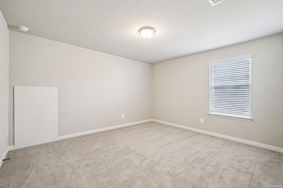 Spacious, unfurnished interior of a new home in Estancia Ranch - Classic Series, San Antonio (Image 28).