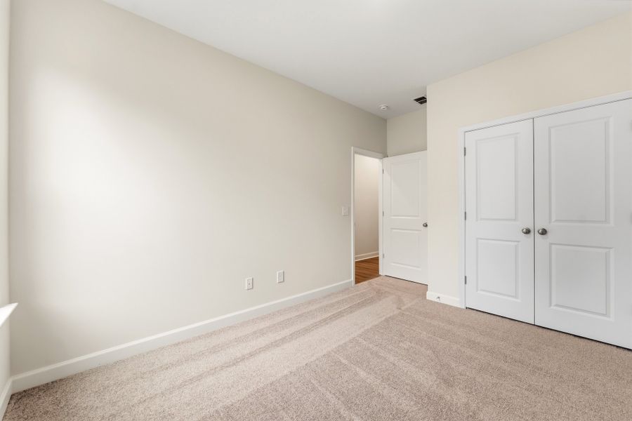 Spacious, unfurnished interior of a new home in Landing at Pine Lake, Anderson (Image 32).