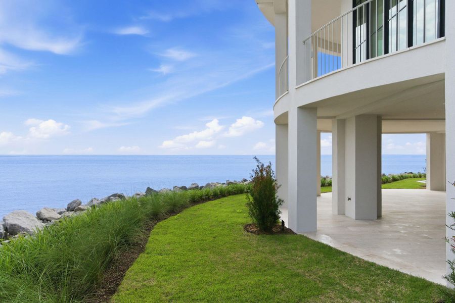 Exterior details and patio area of a home in , Sullivan's Island (Image 37).