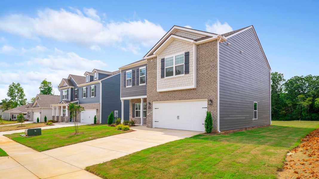 Front exterior of a new home in Fairview Hills, Cleveland, TN, highlighting curb appeal (Image 15). Front exterior of a new home in Fairview Hills, Cleveland, TN, highlighting curb appeal (Image 15).
