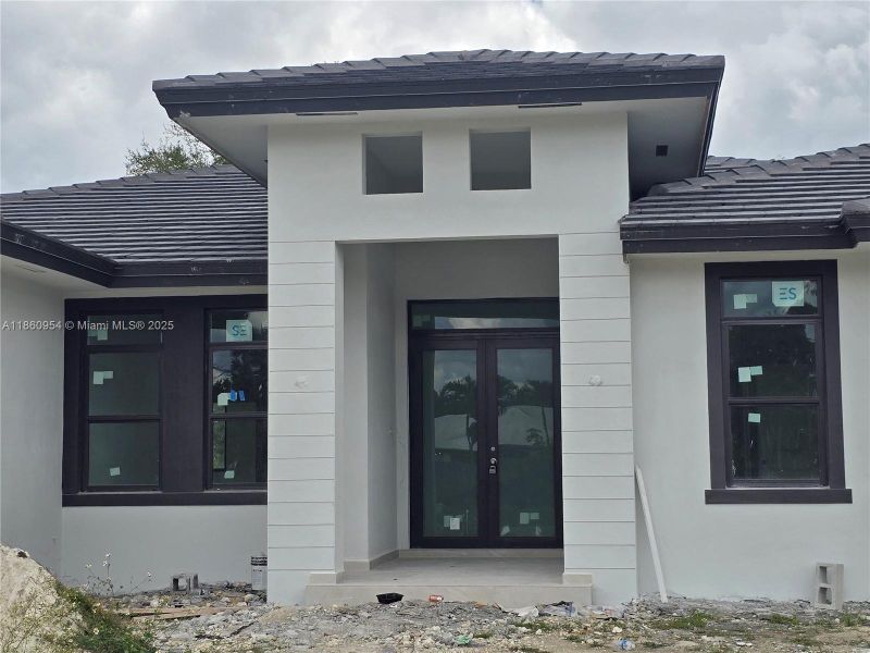 Front exterior of a new home in , Miami, FL, highlighting curb appeal (Image 21).