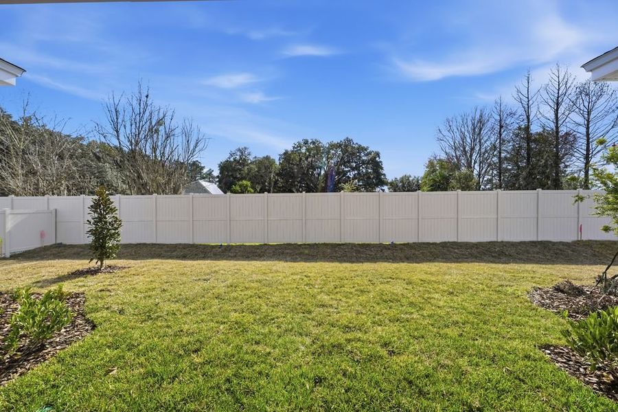 Exterior details and patio area of a home in Headwaters at Lofton Creek, Yulee (Image 4).