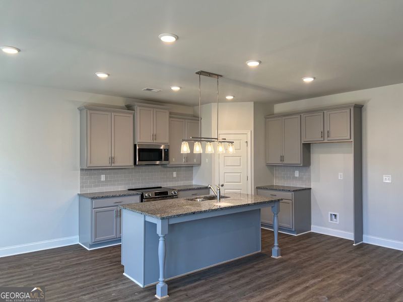 Furnished interior view inside a new home in Harley Farms South, Bonaire (Image 9).