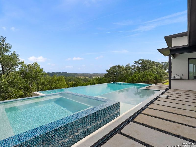 Exterior details and patio area of a home in , Boerne (Image 36).