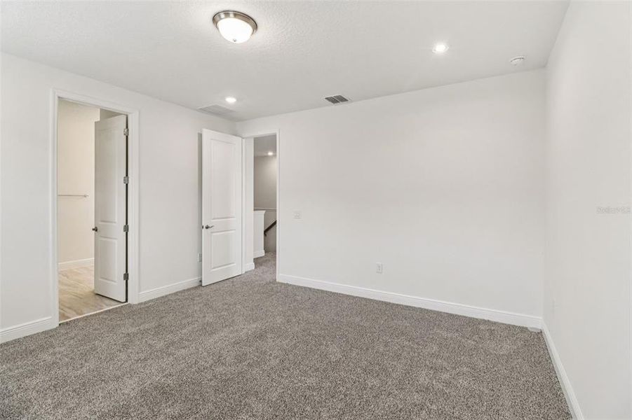 Spacious, unfurnished interior of a new home in Legends Preserve - Signature Series, Daytona Beach (Image 30).