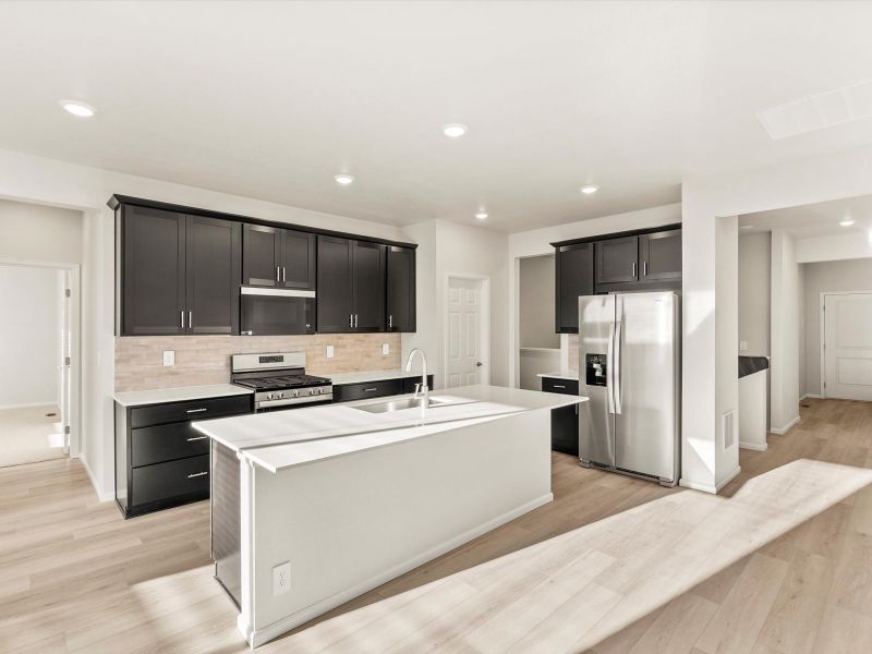 Furnished interior view inside a new home in Paint Brush Hills, Peyton (Image 4).
