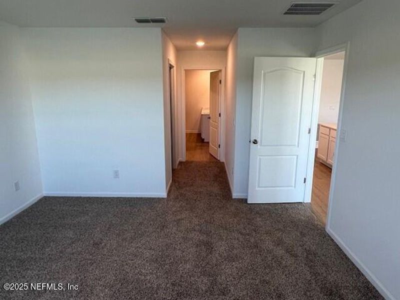 Spacious, unfurnished interior of a new home in Sawmill Branch Express, Palm Coast (Image 48).