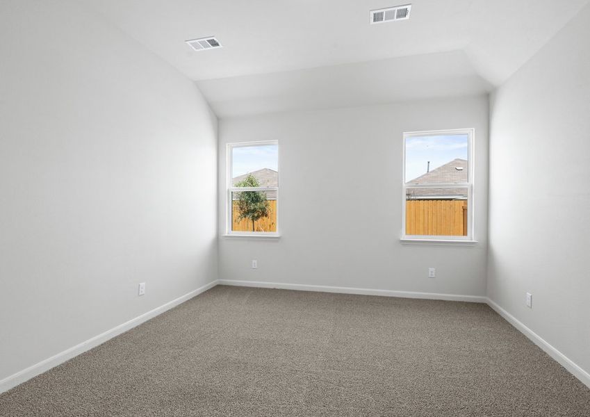 The master bedroom has two large windows. The master bedroom has two large windows.