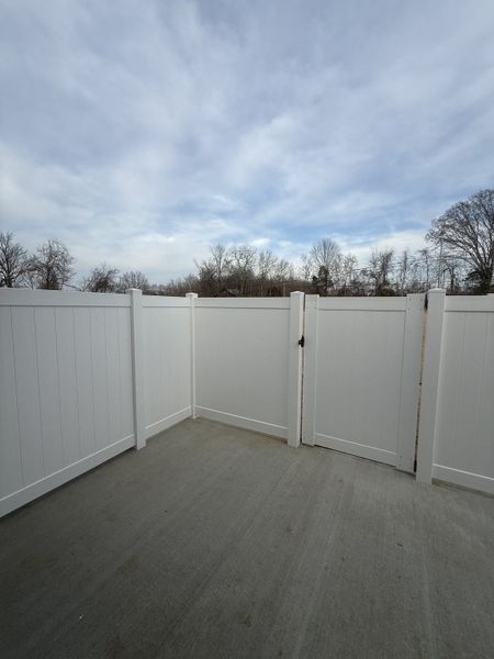 Exterior details and patio area of a home in Legacy Fields, Pleasant View (Image 3).