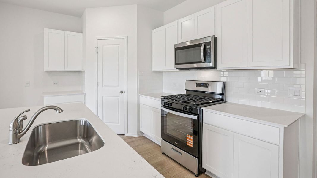 Furnished interior view inside a new home in Carillon, Manor (Image 8).