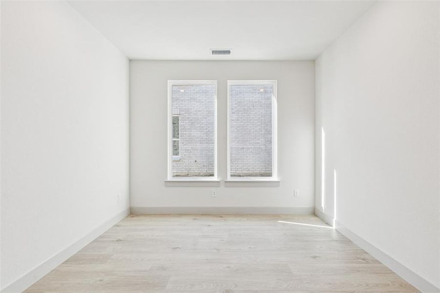 The professional working from home will appreciage this quiet, light filled home office.