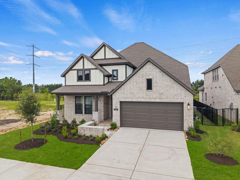 Front exterior of a new home in Bridgeland, Cypress, TX, highlighting curb appeal (Image 24).