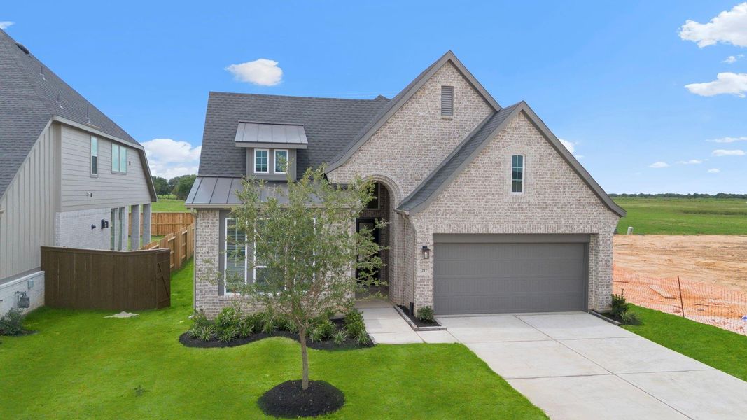 Front exterior of a new home in Attwater, Waller, TX, highlighting curb appeal (Image 24). Front exterior of a new home in Attwater, Waller, TX, highlighting curb appeal (Image 24).