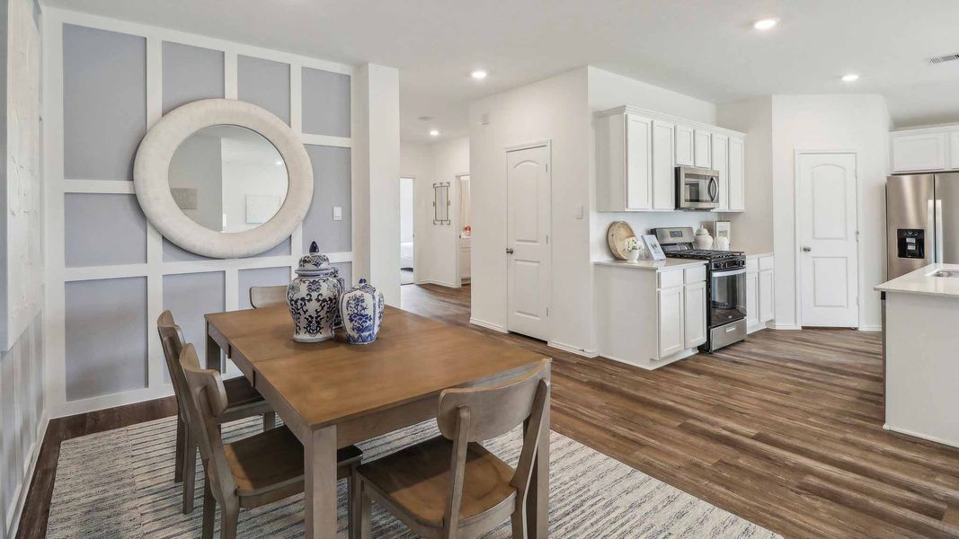 Furnished interior view inside a new home in Sunterra, Katy (Image 9).