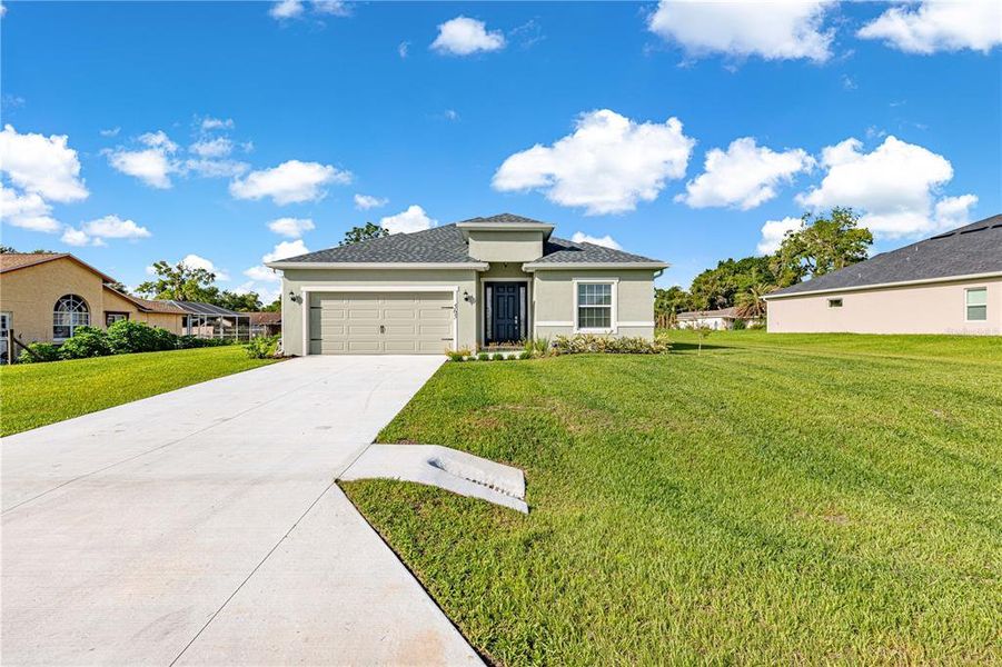 Front exterior of a new home in , Ocala, FL, highlighting curb appeal (Image 28).