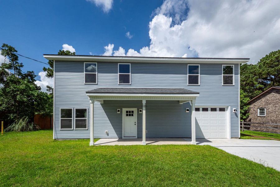 Front exterior of a new home in , Hanahan, SC, highlighting curb appeal (Image 22).