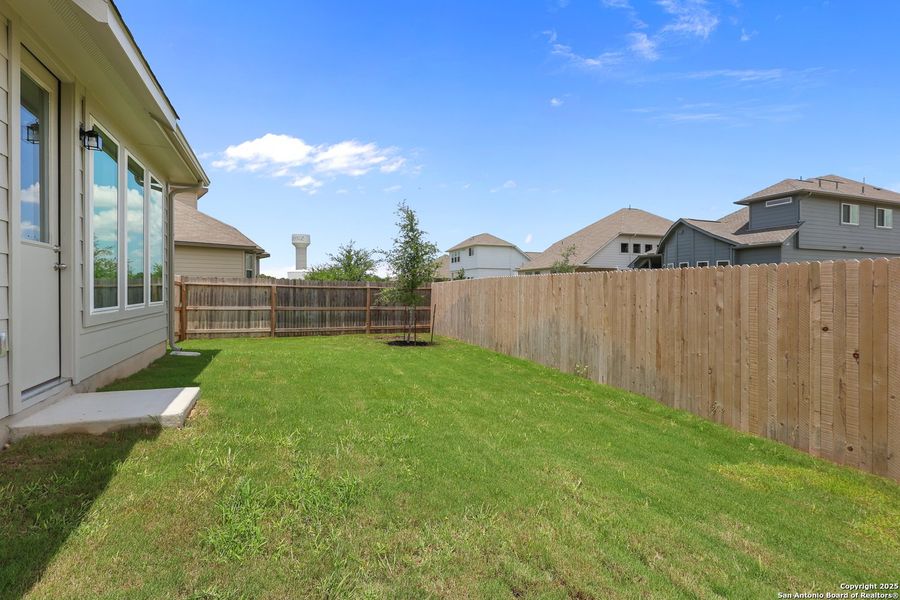 Front exterior of a new home in Rhine Valley, Schertz, TX, highlighting curb appeal (Image 17).