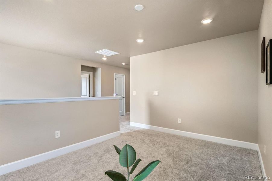 Furnished interior view inside a new home in Sunstone Village at Terrain, Castle Rock (Image 18).