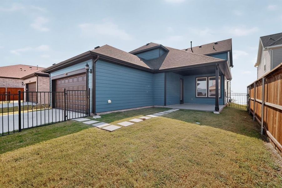 Exterior details and patio area of a home in , Rowlett (Image 3).