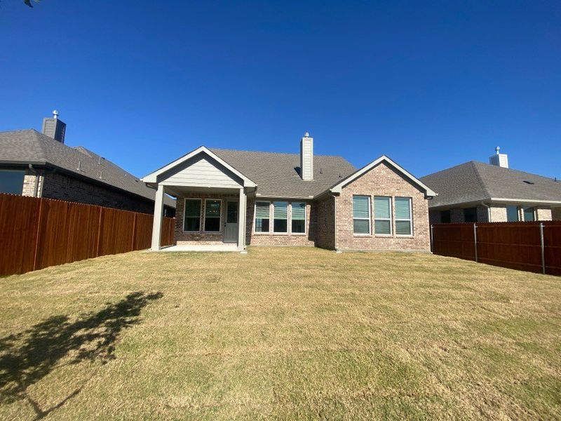 Exterior details and patio area of a home in Morningstar, Aledo (Image 3). Exterior details and patio area of a home in Morningstar, Aledo (Image 3).