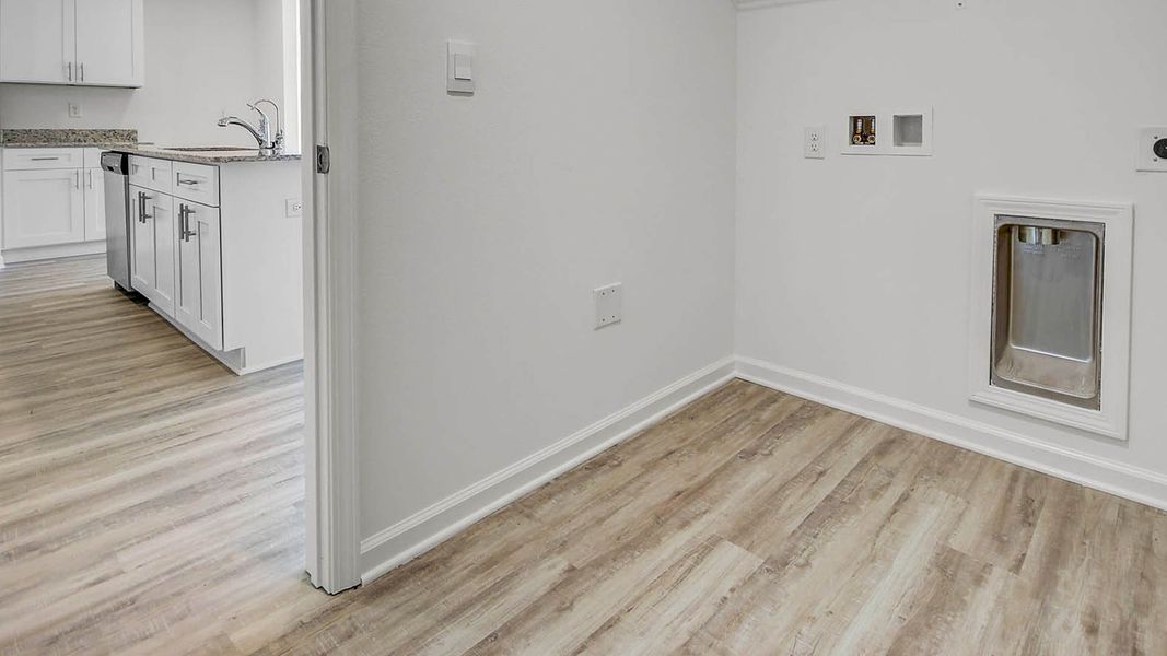 Representative unfurnished interior of a home built from the Lismore by D.R. Horton in Ashton Park Phase III, Freeport (Image 24).