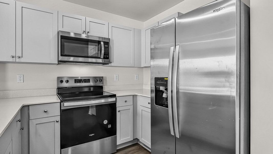 Furnished interior view inside a new home in Edinborough Townes, Gibsonville (Image 7).